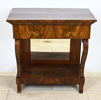 a small wooden table with a drawer on top of it