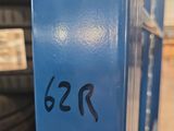 a close up of a blue door with numbers on it