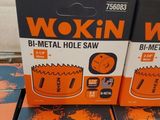 three boxes of wokin bi - metal hole saws on a table