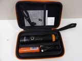 an orange case holding a flashlight and a charger