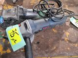an image of a corded sander on a table