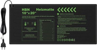 un chargeur de batterie noir et vert sur lequel figurent les instructions