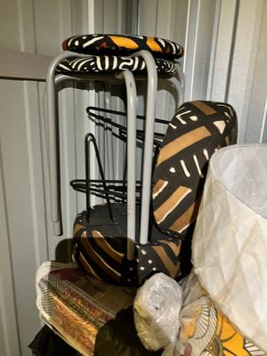 a stack of luggage sitting on top of a pile of luggage