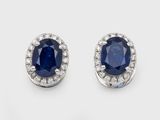 a pair of sapphire and diamond earrings