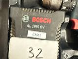 a close up of a drill with a number on it