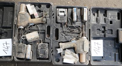 a lot of tools in a case on the ground