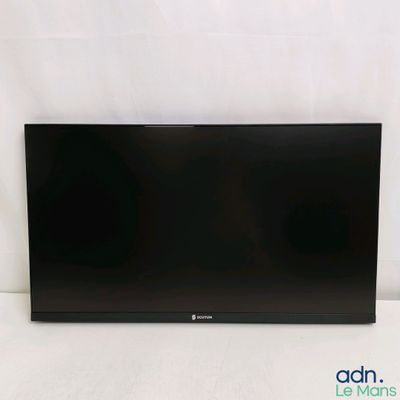the large flat screen tv is sitting on a white surface