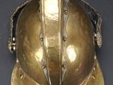 helmet of a fireman with a helmet on it ' s head