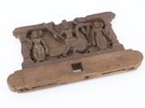 an old wooden carving of a group of people on a boat