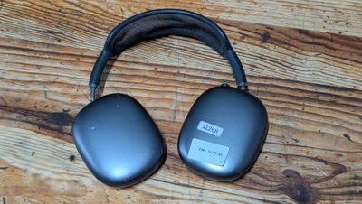 a pair of headphones sitting on a wooden table