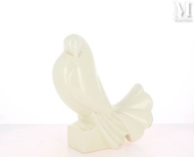 a white statue of a bird on a white surface