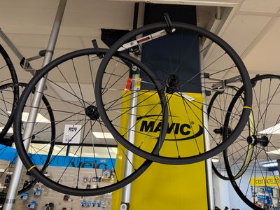 many different types of bikes on display in a store