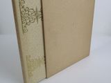 the book is open to show the inside of the cover