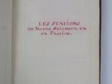 an open book with red writing on it sitting on a table