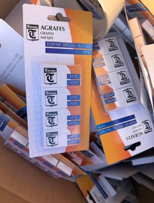 a cardboard box filled with many different types of labels