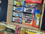 a box of toy cars and a box of other toy cars