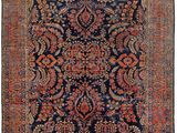 tapis persan ancien à motif floral sur fond bleu