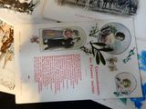 many old postcards on the table with pictures on them