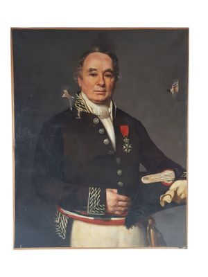 portrait of a man in a military uniform holding a book