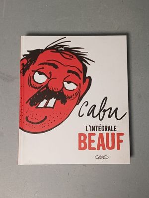 a close up of a book with a cartoon face on it