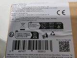 the back of a box with a barcode on it sitting on top of a table