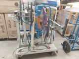 a machine that is sitting on a cart in a warehouse