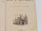 un vieux livre avec la photo d'un homme et d'une femme assis sur un banc