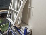 a man that is working on a machine in a room