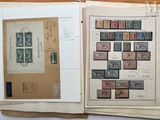 two pages of old stamps are on top of each other