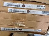 boxes stacked on top of each other in a warehouse