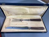 a box with a knife, fork and knife in it