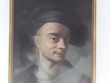 a portrait of a man with a hat on a wall