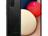 the back of a black samsung galaxy s20 with a red ball on top of it