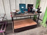 a workbench with tools on it in a garage