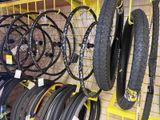 many different types of bikes on display in a store