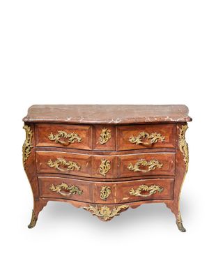 an image of a chest of drawers with a marble top
