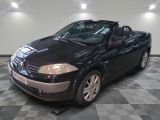 a picture of a black convertible car parked in a garage