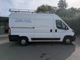 a white van that is parked in a parking lot