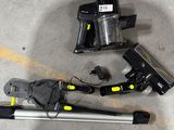a picture of a pair of skis and ski poles on the ground
