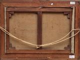 an old wooden frame with a rope hanging from it ' s sides