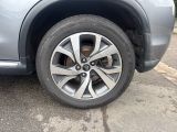 a close up of a tire on a car
