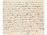 a letter written in black ink on a piece of paper
