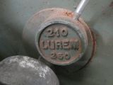 a close up view of a rusted gas hydrant with the number twenty on it