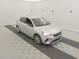 a picture of a white car parked in a garage