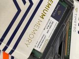 a close up of a computer memory card and a cell phone
