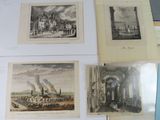 several pictures of a bunch of paintings on a table in a room