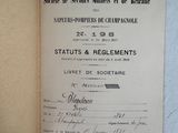 an open book with a black and white image of a document