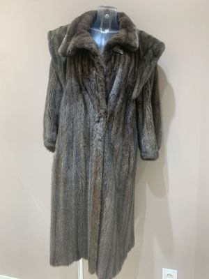 an image of a fur coat on a mannequin stand
