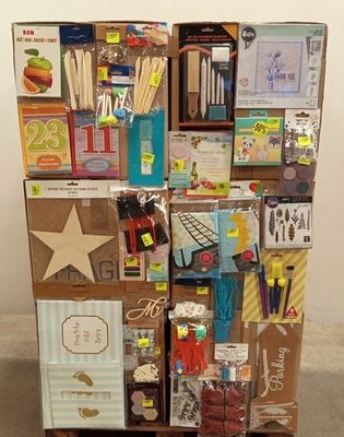 a cardboard box with many different items on it