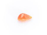 an orange oplite gems on a white background